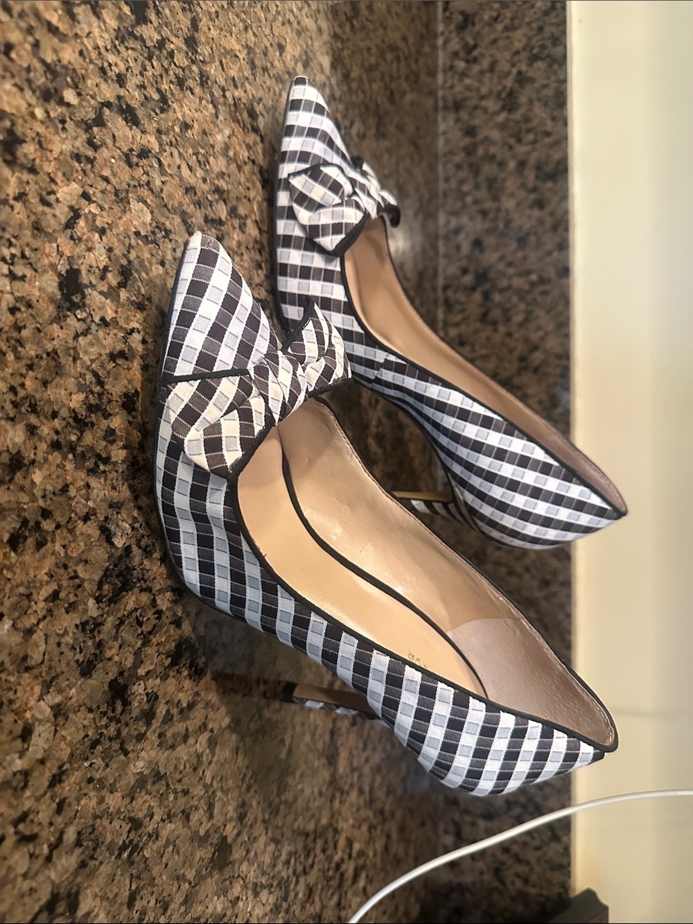 Black and White Pointed-Toe Pumps with Bow